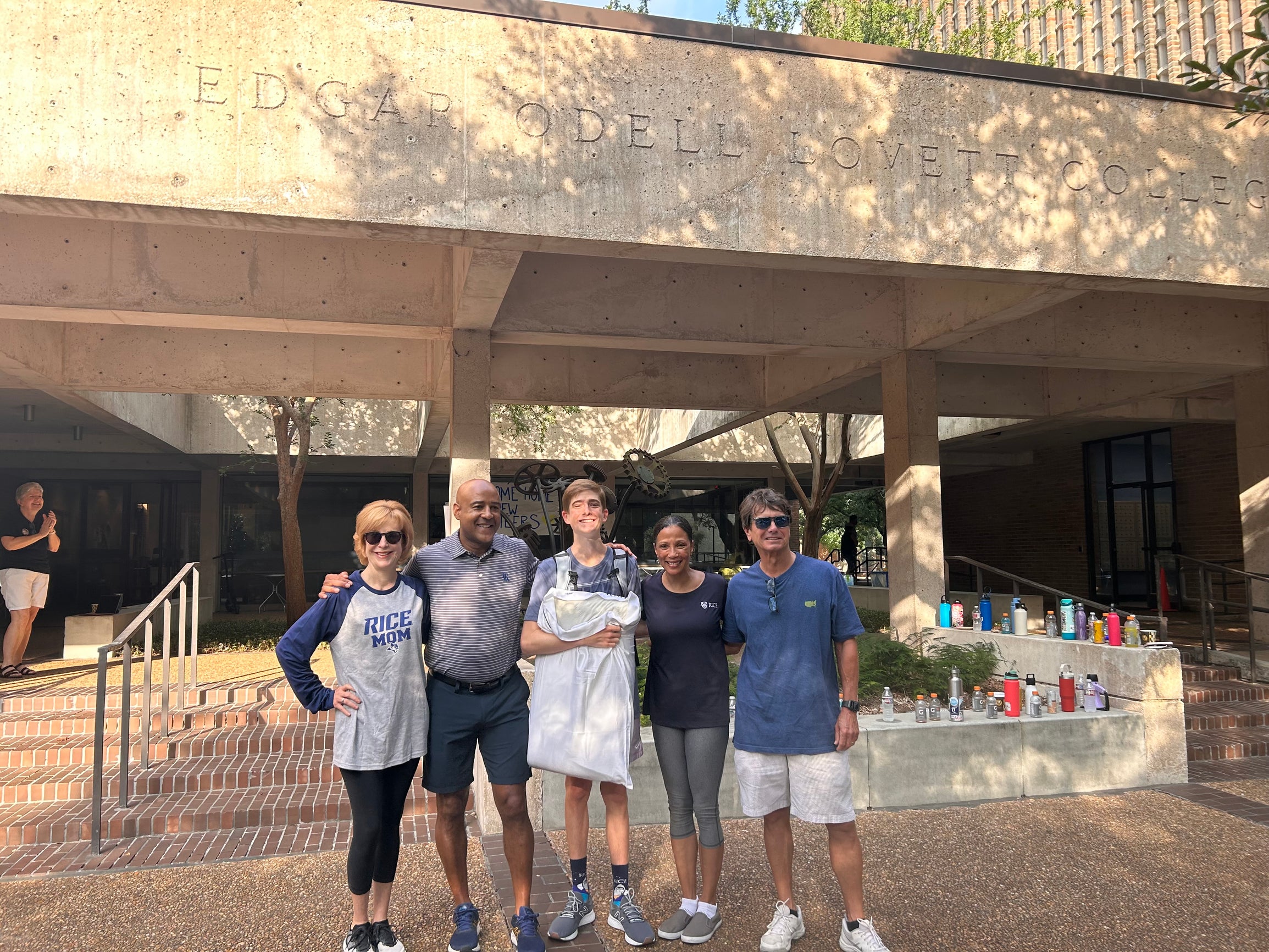 Bruce Hurley (middle) with his parents and the DesRoches during move in