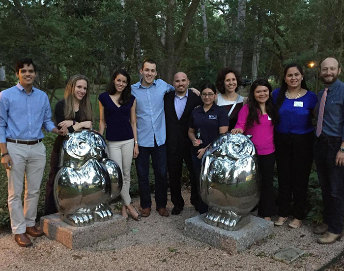 SOLAR group with owl statues